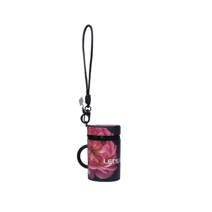 Phone charm with floral design and 'Let's Go' text on a white background